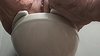 She's Enjoying Rubbing Her Pussy on the Toilet