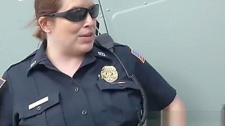 Redhead cop sucks a big black cock