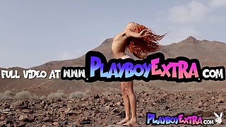 Naked ebony teenager posing in the desert