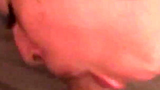 Nasty brunette sucks his cock in POV on the bed