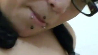 Willing brunette masturbates on her bed with sexy toys