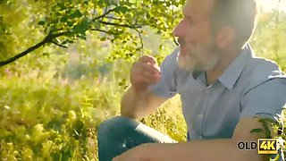 Old4k. cutie sucks older cock and gets it in her tiny snatch outdoors