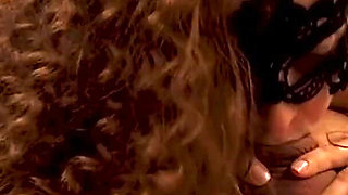 Curly-haired milf swallows cock deep into her throat