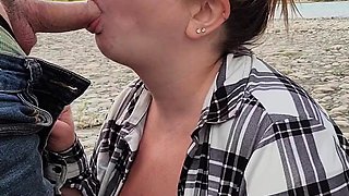 Amazing busty brunette slut doing blowjob outdoor