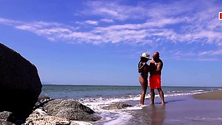 Fucking a teen outside on the public beach