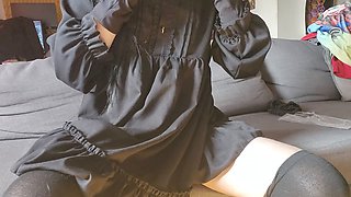 Emo cutie gets busy with a fake penis