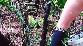 Peeing on a Toilet in the Woods