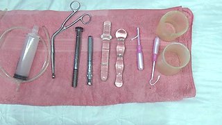 Lesbian piss inside the Uterus of other with tube in PeeHole