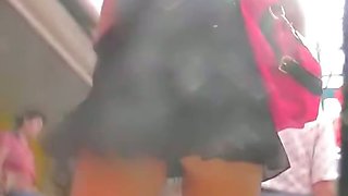 Amazing butt cheeks dancing up skirt