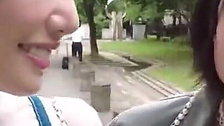 A Blonde and a Dark-haired Beauty Share Wild Passion Beneath the Open Sky. - a