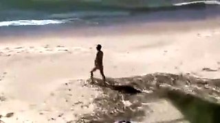 A Voyeur Films A Couple On Beach