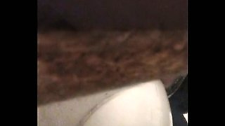 Slender white brunette teen with skinny as filmed from above in the toilet