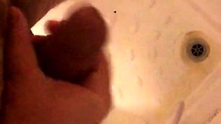 Masturbating and wanking my hard cut cock under the shower