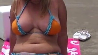 Wife masturbates on beach