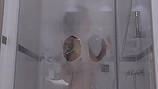 A Slut Dildos Herself During Her Shower, Comes to Watch on Her Through the Transparent Glass Window