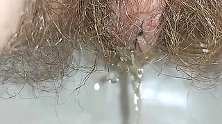 I'm Taking Close-ups of Myself Peeing in the Toilet
