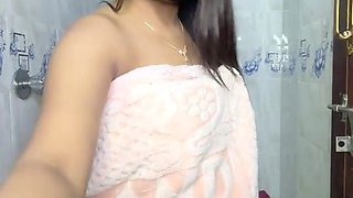 Feel raw Indian passion in a model's daring intimate strip display