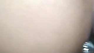 Married Woman Swallowing Milk From the Fountain and Smiling