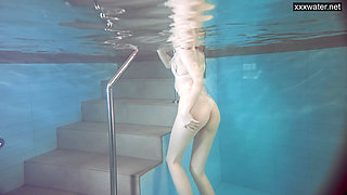 Sasha Vetochka goes naked into the pool