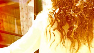 Petite brunette MILF strips nude in car