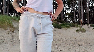 POV. You Watch as a Busty Model, of Your Presence, Strips Naked on the Beach, Bathes, and Plays in the Sand.