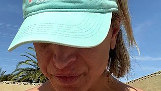 Blonde is flashing her big boobs in the outdoors