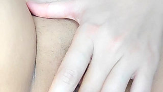 Naughty woman fingering her pussy and teasing.