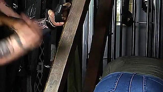 Slave Mila's Feet Dangle and Quiver as Mistress Baton Breaks in Heavy Wooden Paddle Over Her Jeans and Bare