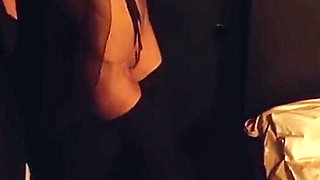 Striptease dancer in black dress showing her pussy