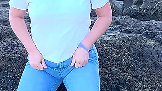 Peeing in Tight Jeans on the Beach