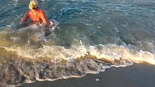 Try Not to Wet My Hair While Play with the Waves