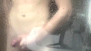 Boy takes a shower, jerks off and cums