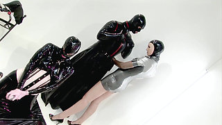 Latex femdom sitting on a slave's face