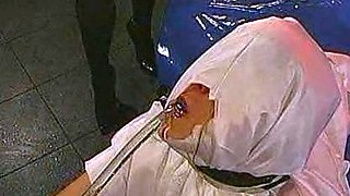 Sexy brunette in black stockings fucks in group sex