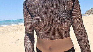 flashing tits and pussy on the beach