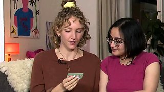 Amateur ash-blonde and brown-haired play cards before using