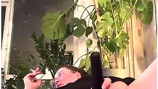 Playing with a magic wand and smoking