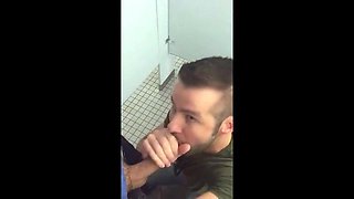 Hunk gives blowjob in a public restroom - amateur gay porn