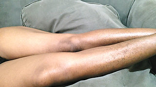 A Woman with Lots of Beautiful Pubic Hair Between Her Legs Lies on Her Sofa Waiting to Be Made Love to Her