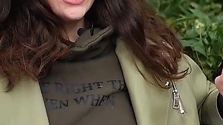 Young Brunette Is Taking an Unhurried Stroll with Allwhite 120mm Cigarette