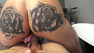 Tattooed Brunette Babe Sucks and Fucks Big Cock