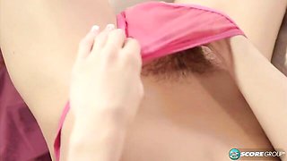 Alluring model with small tits Candy Love plays with her shaved pussy