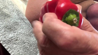 Pressing big red paprika in my tight ass ..