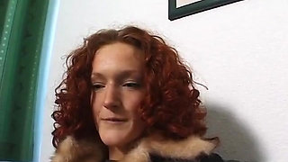 Cute redhead fingering her love hole