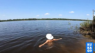 Blonde Solo Nudist Shows Off Tattoos by the River