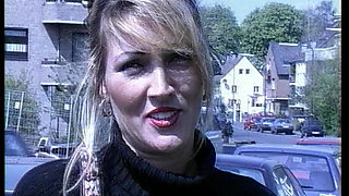 Pretty German lady stuffing herself in solo action