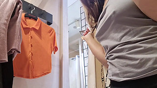 flashing tits in the fitting room with the curtain open