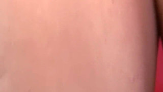 Busty Short-haired MILF Fingers Herself on the Red Couch