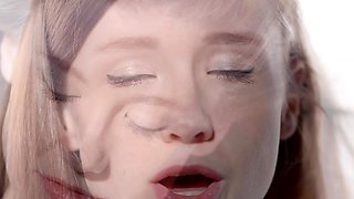 Busty babe playing with her big boobs