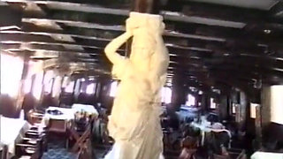 A Cook Is Cut by Her Customers in the Kitchen.